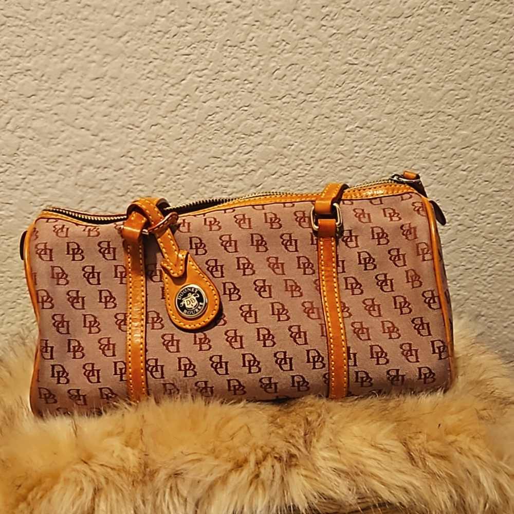 Dooney and Bourke Cylinder Bag nice pink